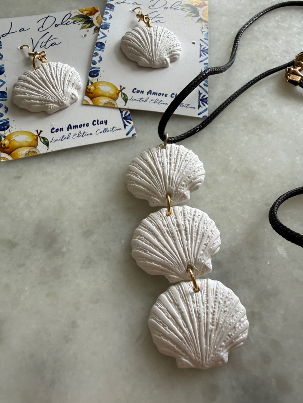 Dolce Vita White Shell Dangle Earrings - Picture 2 of 2